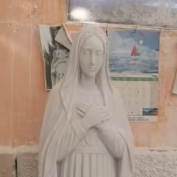 Our Lady with hands on chest