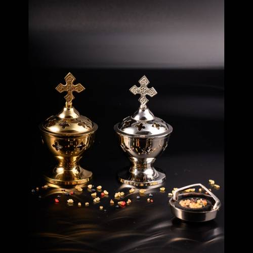 Incense burner with perforated crosses